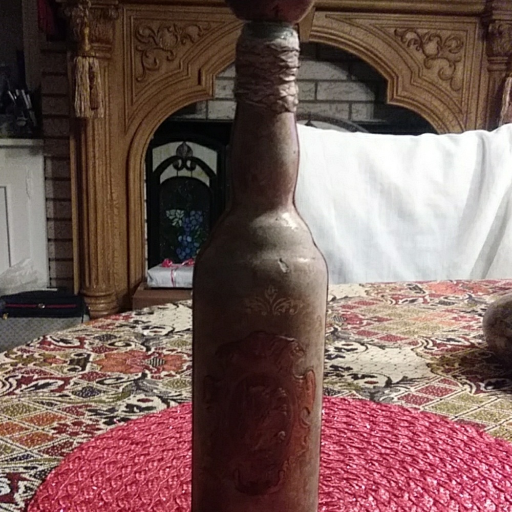 Vintage leather covered bottle.